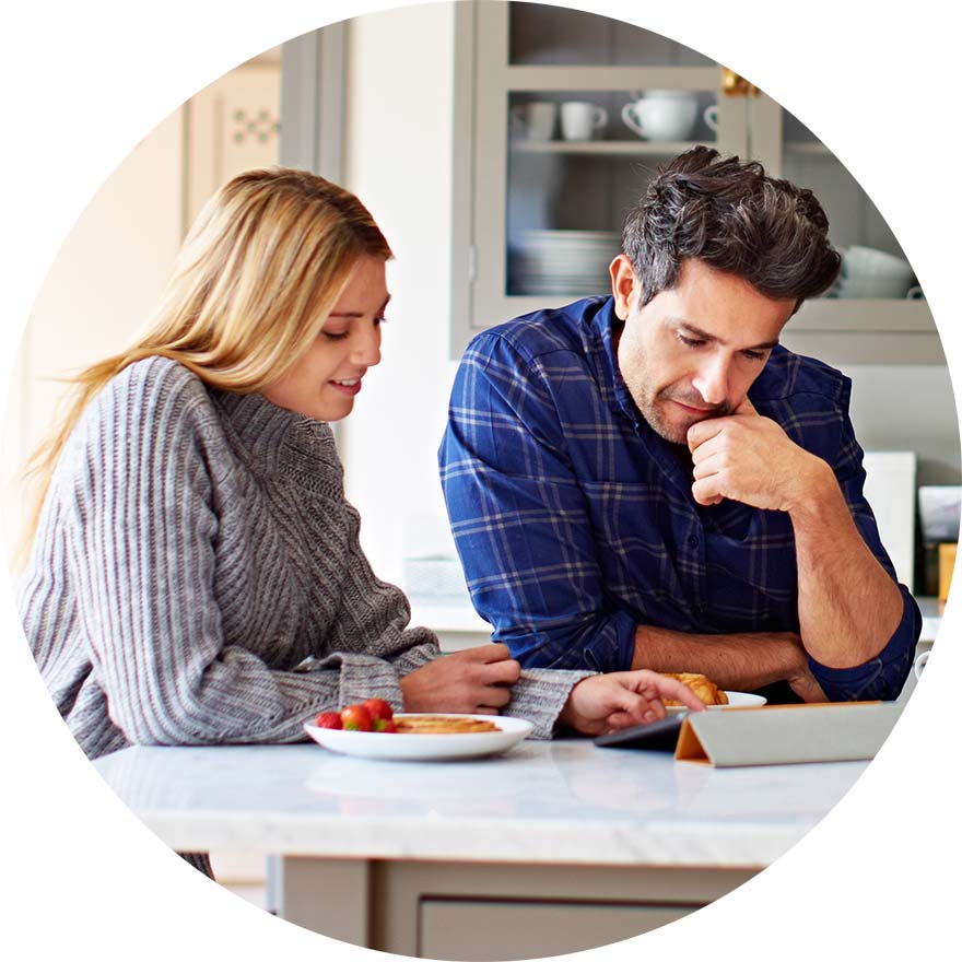 Couple reviewing private pension documents